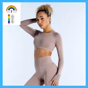 Designer dupe Dynamic Long Sleeve Crop Top Long sleeve Cropped fit Subtle contouring Ribbed underband Open back with twist at neck Sexy Fitted Long Sleeve Crop Top