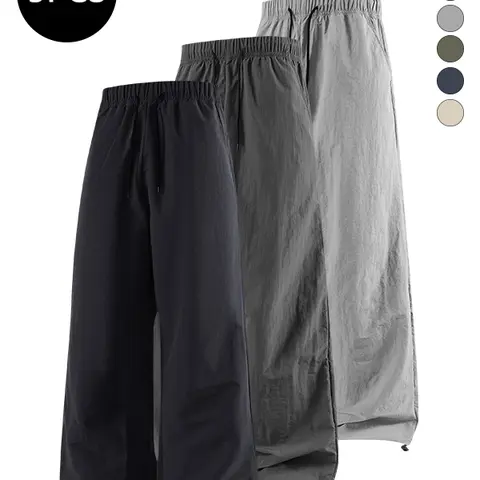 Men’s spring/autumn straight-leg ruched casual pants — trendy high-street streetwear, versatile loose fit for fitness; one pair, two ways to wear; elastic cuffs; men’s style.
