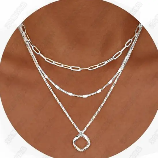 Silver Circle Paper Clip Flattening Chai