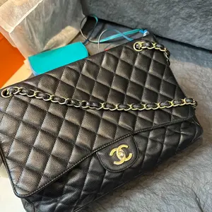 Pre-owned CHANEL Black Caviar Maxi Classic Single Flap