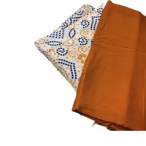 Coral Somali Baatik Fabric Set - Vibrant Orange & Patterned White Textiles for Traditional Wear
