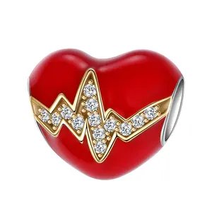 Copper silver-plated charm bead featuring a red heart enamel and gold-tone pave “heartbeat” design for romantic jewelry—ideal as a Valentine’s Day, Mother’s Day, or anniversary gift