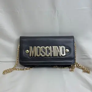 Pre-owned MOSCHINO leather Clutches & Wristlets clutch bag