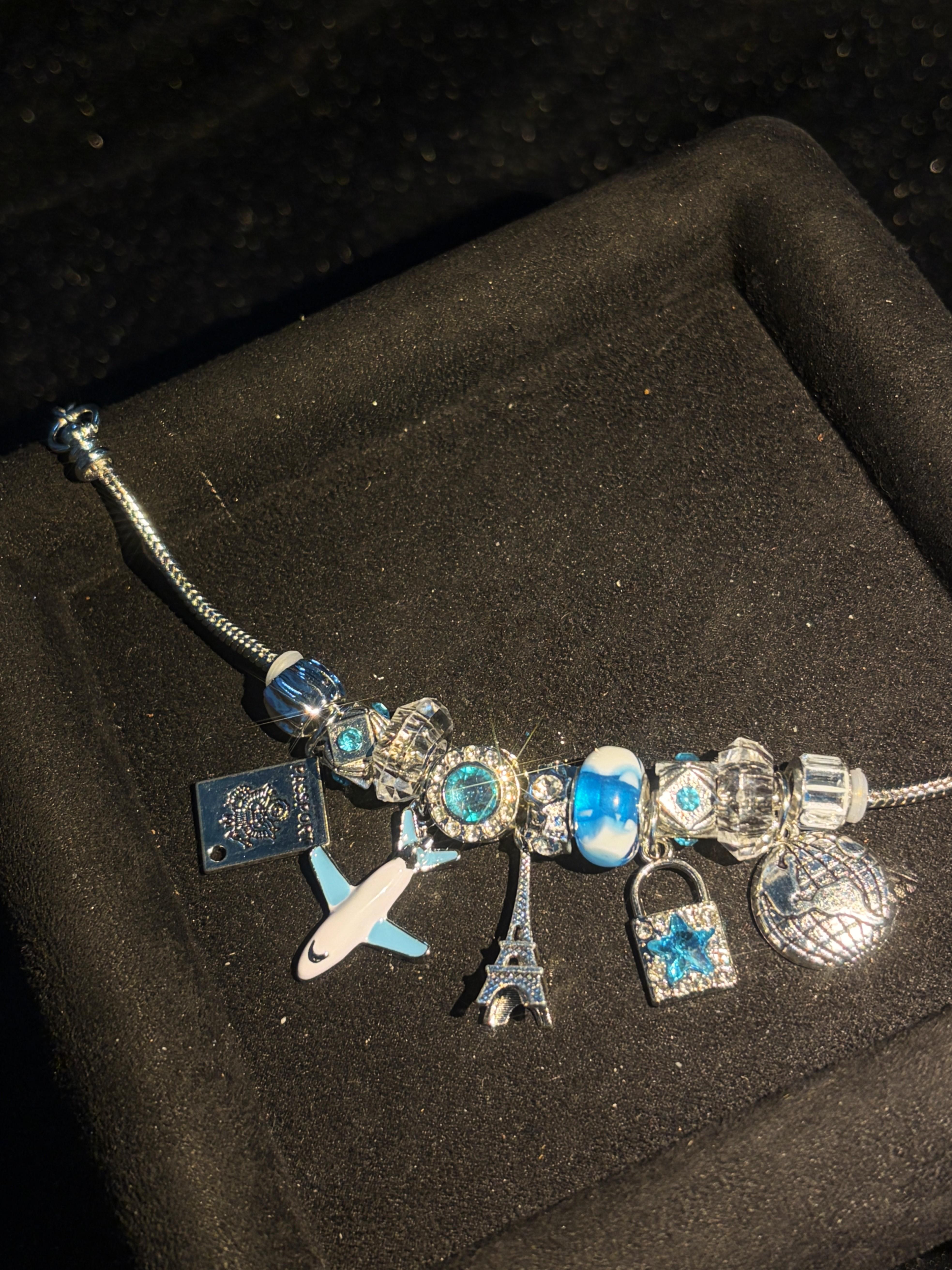 Travel Theme Charm Bracelet, Silver Tone Snake Chain Bracelet with Airplane, Eiffel Tower, Passport, Globe Lock Dangle Charms, Blue Crystal Beads Travel Souvenir Jewelry Gift for Women Girls Travel Theme Charm Bracelet, Silver Tone Snake Chain Bracelet with Airplane, Eiffel Tower, Passport, Globe Lock Dangle Charms, Blue Crystal Beads Travel Souvenir Jewelry Gift for Women Girls