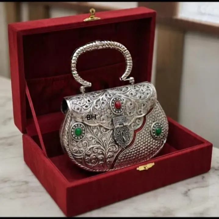 Metal Minakari Clutch with Intricate Designs and Green Stones