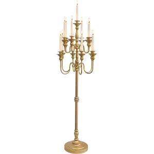 A 51-inch tall wedding candelabra for parties; a large gold candelabra suitable for home decor at events A 51-inch tall wedding candelabra for parties; a large gold candelabra suitable for home decor at events