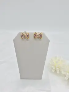 Pink bow earring in 14k gold plated. (101)