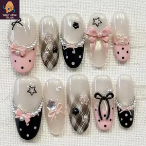 Coquette Bow Pearl Press On Nails, handmade gel nail art with pink nude pastel tones, ribbon bows, pearl chain details, polka dot and plaid accents, sweet elegant aesthetic, reusable press on nails for daily wear, party, date night, feminine style