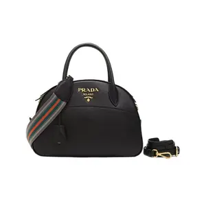 Pre-owned PRADA · Shoulder Bags Black Shoulder Bag with Gold Tone Engraved Logo