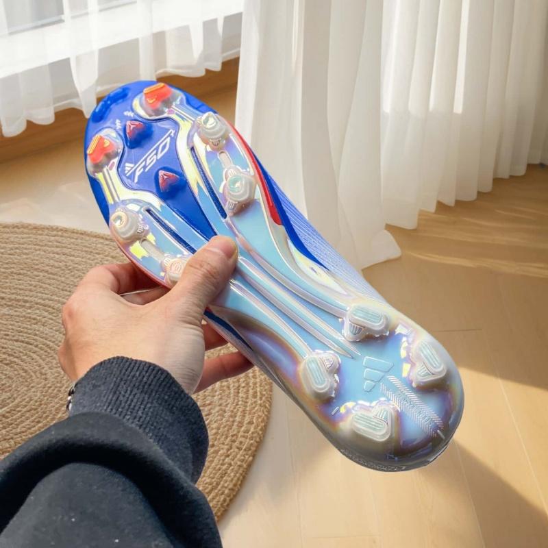 Comfortable and versatile synthetic turf soccer shoes in white and red