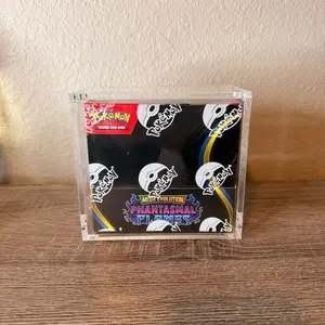 Pokemon Premium Acrylic Booster Box display case only , strong magnetic close, crystal clear, uv protection , thick acrylic Dust scratch secure and protect your collection. Booster box case only! Fits standard English booster box