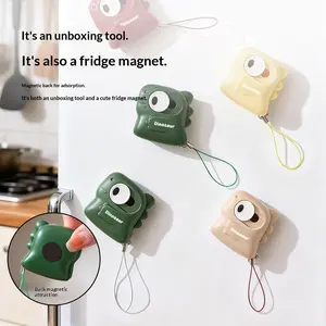 A cute dinosaur-shaped opening tool, suitable for opening boxes and bags. It is portable and has a safe keychain design for opening. Made with ceramic craftsmanship and featuring a magnetic suction and automatic rebound function. gifts for boyfriend