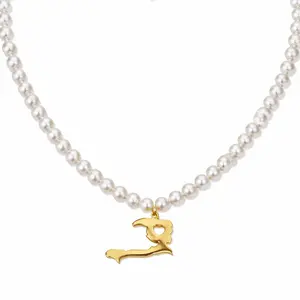 Ayiti Pearl Necklace with Round Beads and Gold Pendant