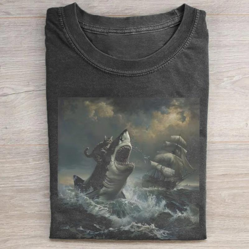 Great White Shark Cat Rider T-Shirt, Epic Stormy Sea Sailing Ship Graphic Tee, Vintage Wash Ocean Adventure Illustration Top, Viral Internet Meme Wash Shirt