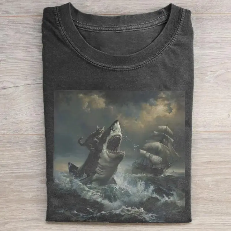 Great White Shark Cat Rider T-Shirt, Epic Stormy Sea Sailing Ship Graphic Tee, Vintage Wash Ocean Adventure Illustration Top, Viral Internet Meme Wash Shirt