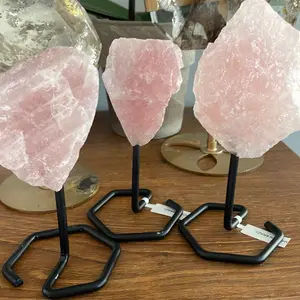 Raw Rose Quartz on stand