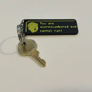 You are overencumbered and cannot run fallout keychain
