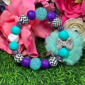 Checkered sea wristlet Keychain color scheme turquoise, white, purple checkered print and  bling beads circled with wire