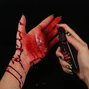 Fake blood spray creating a splatter effect