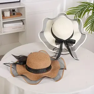 Outdoor beach hat, women's wide-brimmed straw sun hat with bow and ribbon, arched sun protection hat.