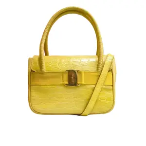 Pre-owned SALVATORE FERRAGAMO . Top Handle Bag Vara handbag with a crocodile embossed finish and a shoulder strap Authentic secondhand