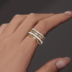 Four-tiered women's gold and silver mixed-color stacked rings, featuring an interlaced and unique design, and a stylish 14K two-tone connecting ring
