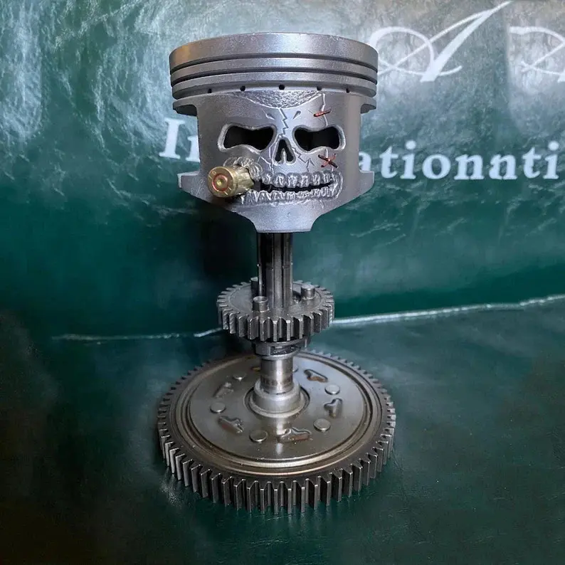 Custom Piston Skull Sculpture on Gear Base Custom Piston Skull Sculpture on Gear Base