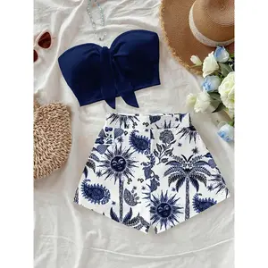 Women's island vacation palm tree and sun god print two-piece set, perfect for summer vacation and fashionable spring styling