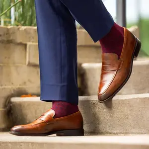 The Bartons - A Deep Red Sock with Navy Polka Dots