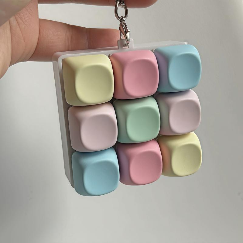 Keyboard-Style Fidget Toy Keychain-Portable Durable Backpack Accessory for Adults with 4 & 9 Key Design and Button Fidget Mindful Fidgeting Aid，Everyday Gift.  Hand Feel. Keystroke Response. Relaxation. Tactile Feedback.  Soft Desk Decor .Crisp Silicone