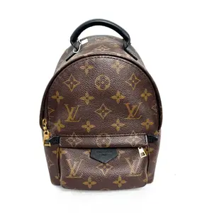 Pre-owned canvas Backpacks Louis Vuitton Monogram Palm Springs Mini Backpack Bag Classic Design with Leather Straps and Single Zip Closure