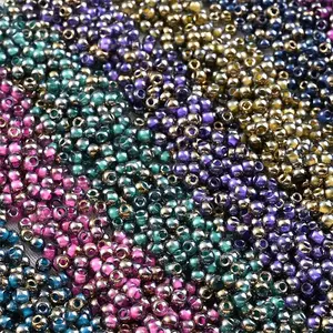 1200 Pcs Glass Seed Beads Set for Jewelry Making, Featuring 10 Colors of 4mm Semi-Golden Rice Beads, Each Pack Containing 10 Grams for a Total of 100 Grams (3.53 Ounces). These High-Quality, Evenly Sized Mini Beads Are Perfect for Projects