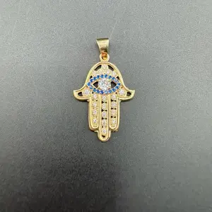 Gold 14k pendant hand and eye design for everyday wear