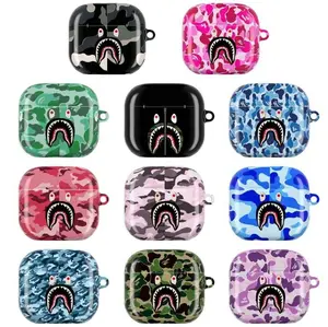 Shark Camo Streetwear AirPods Case Collection  Bold Shark Mouth Icon with Military Camouflage Patterns  Urban Hypebeast Tactical Aesthetic Half-Black Design  Durable Protective Cover for AirPods 1 2 3 4 & Pro