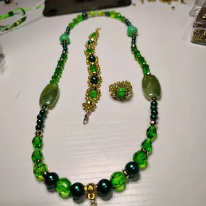 Green Beaded Necklace Bracelet and Ring Set with Gold Accents and Matching Green Beads for Elegant Outfits