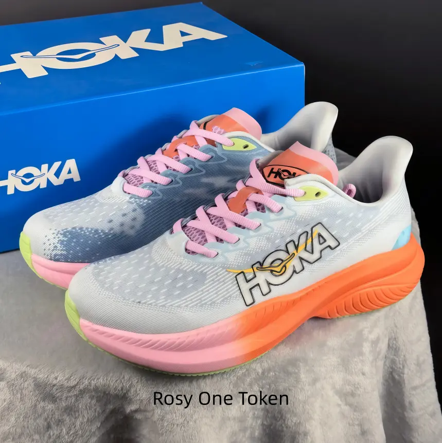 This pale grey speckled mesh running shoe carries tender spring pastel vibes. Breathable perforated mesh stays cool all day, gradient pink-orange wave midsole softens pavement impact.
