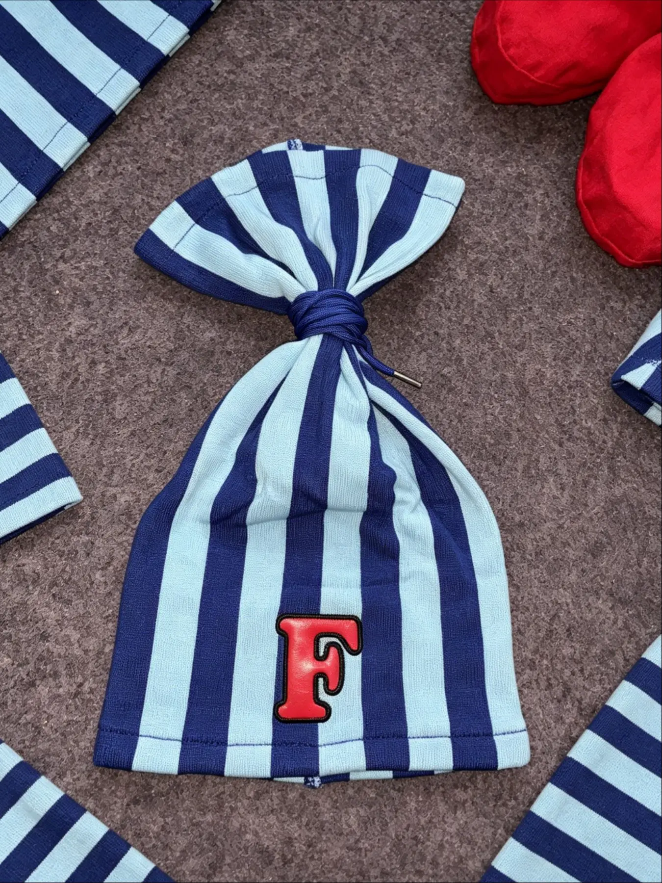 Unisex Striped Warm Hat with Knot Top and Letter F Embroidery, Letter Embroidered Hat, Y2K Street Fashion Accessory, Headwear for Men and Women, Beanie Hats