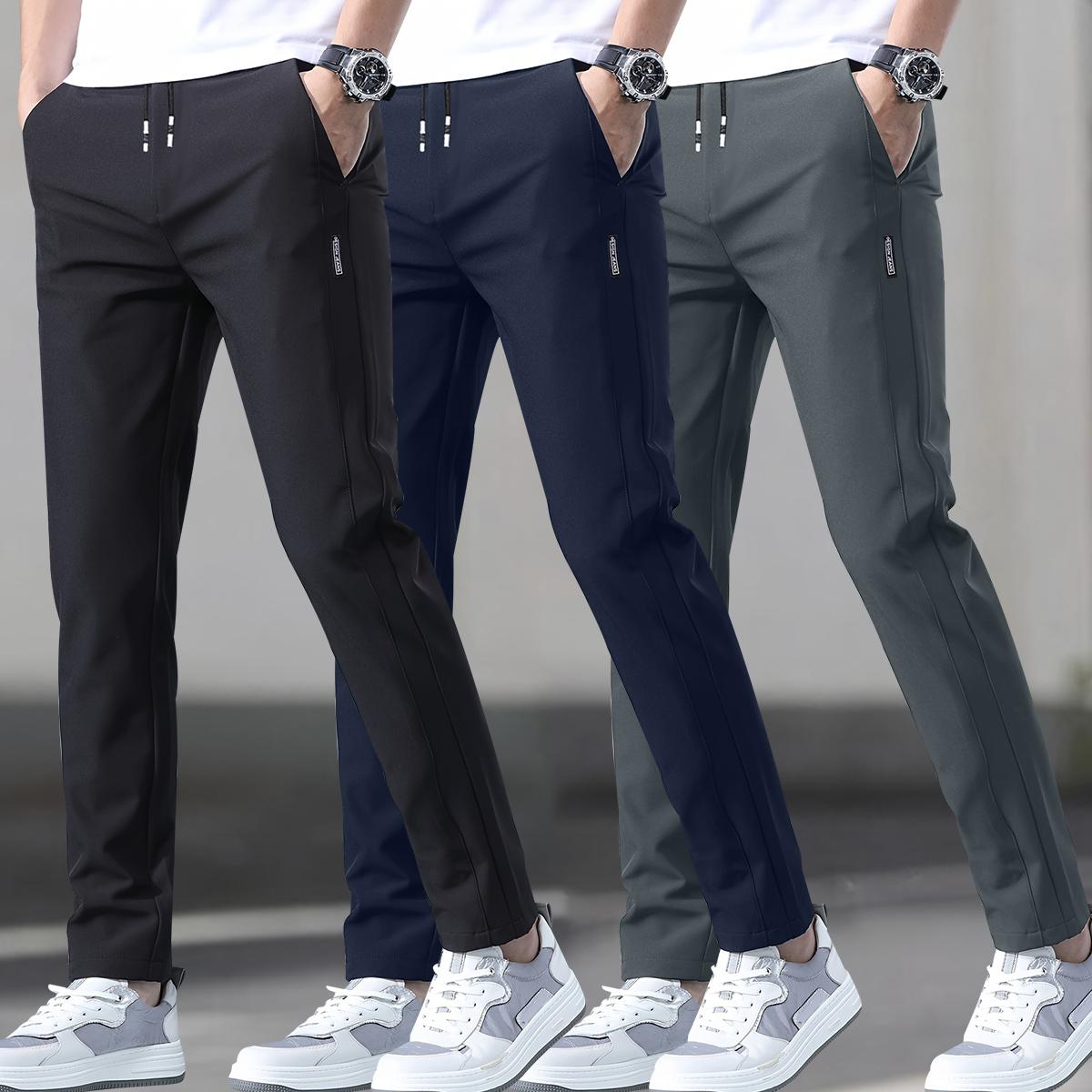 Men's 3-pack slim fit straight leg casual pants, polyester spandex blend, featuring an elastic waistband with drawstring, mid-rise, side pockets, suitable for outdoor activities and everyday wear SpringStatements