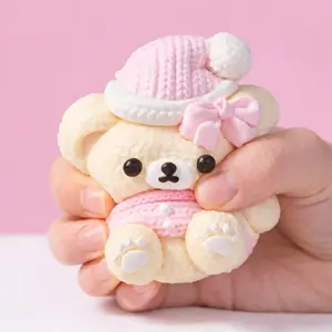 SqueezeSquad Taba Deluxe Premium Silicone Squishy Fidget Toy Pink Hatted Bear Stress Relief Collectible Fun 10cm x 8cm x 4cm