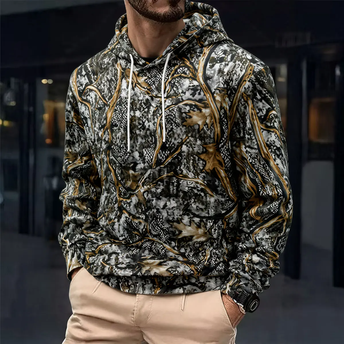 The tough and stylish men's camouflage hooded sweatshirt features a classic jungle pattern and a conventional silhouette, designed specifically for energetic outdoor and urban living Menswear Pullover Tops