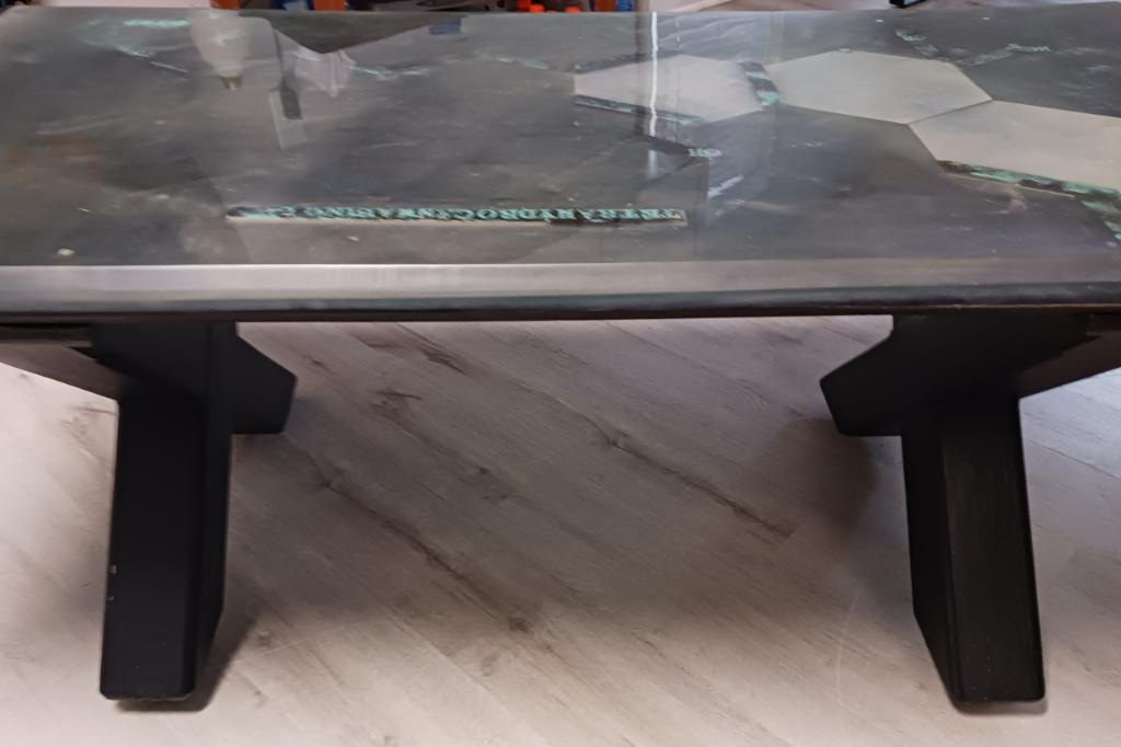 Cross Legs epoxy table featuring the tetrahydrocannabinol compound in multiple layers of epoxy providing a deep tridemtional feel