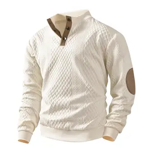 High quality men's loose fit Henry collar top with a regular silhouette featuring a semi high collar and button details with diamond stitched patterns and leather elbow inserts for casual home sports and a vintage look