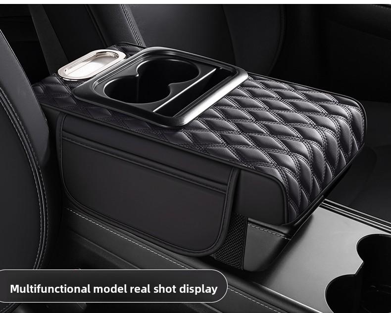 Leather car armrest cushion! This multi-functional pad holds cups, tissues, and storage—no more dangling arms on long drives! Solve all your road trip pain points for the price of a bubble tea!
