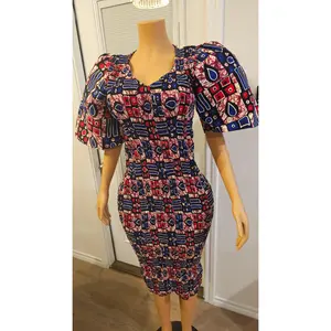 The Nia Smokey Gown, meaning “purpose,” is a refined smokey Ankara dress