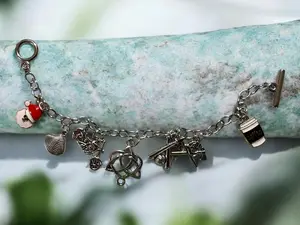 Hold Fast Charm Bracelet - Stainless Steel Charm Bracelet with stainless steel and enamel charms of all kinds!