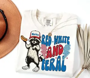 Comfort Colors Red White and Feral Shirt, Funny Patriotic Raccoon Hotdog T-Shirt, Retro America Graphic Tee, Cute 4th of July Independence Day Shirt, USA Summer Outfit - HARSIN