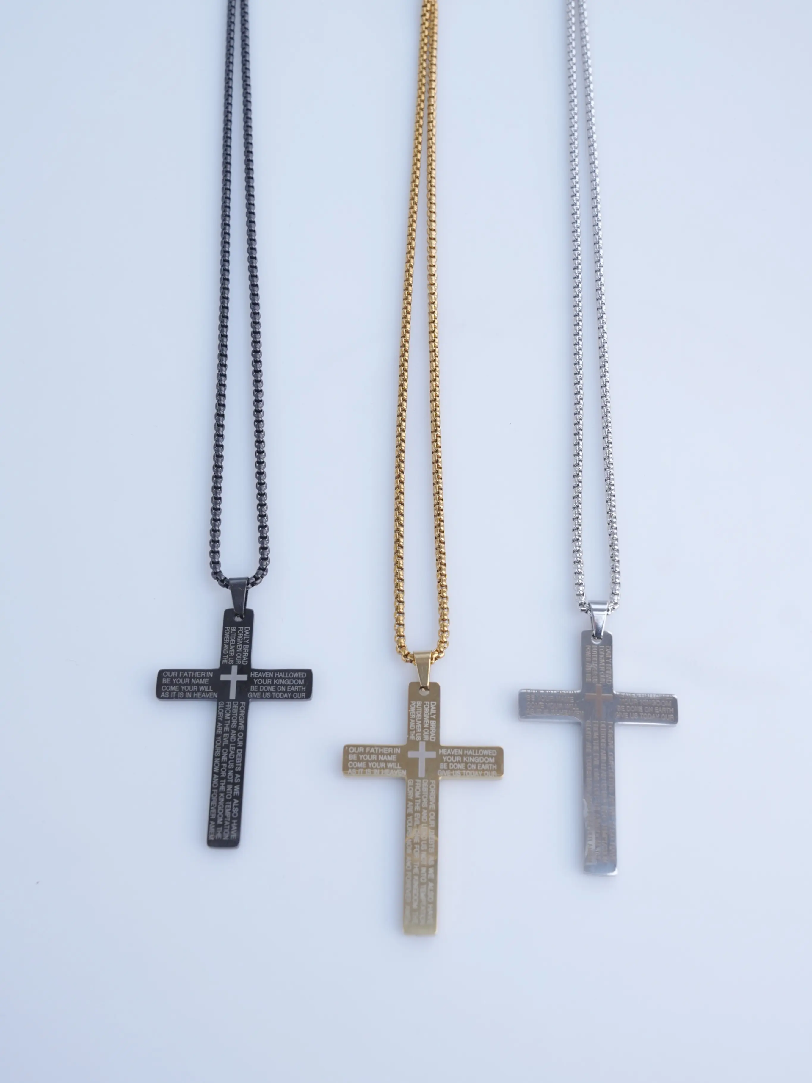 Stainless steel cross pendant necklace with engraved Bible verse; a fashionable accessory suitable for men and women, ideal for parties and everyday wear; also an elegant birthday gift set available in three color combinations.