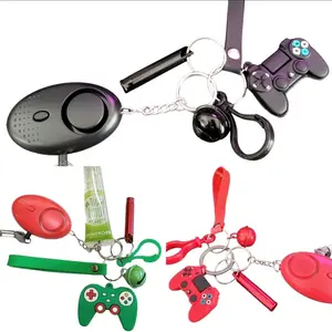 Green, Red or Black Gamer Kids Safety Keychains   - Game Controller  Charm Keychains   - Wristlet w/Clip  - Whistle   - Alarm Siren   - Lip Gloss (Random Flavor)   