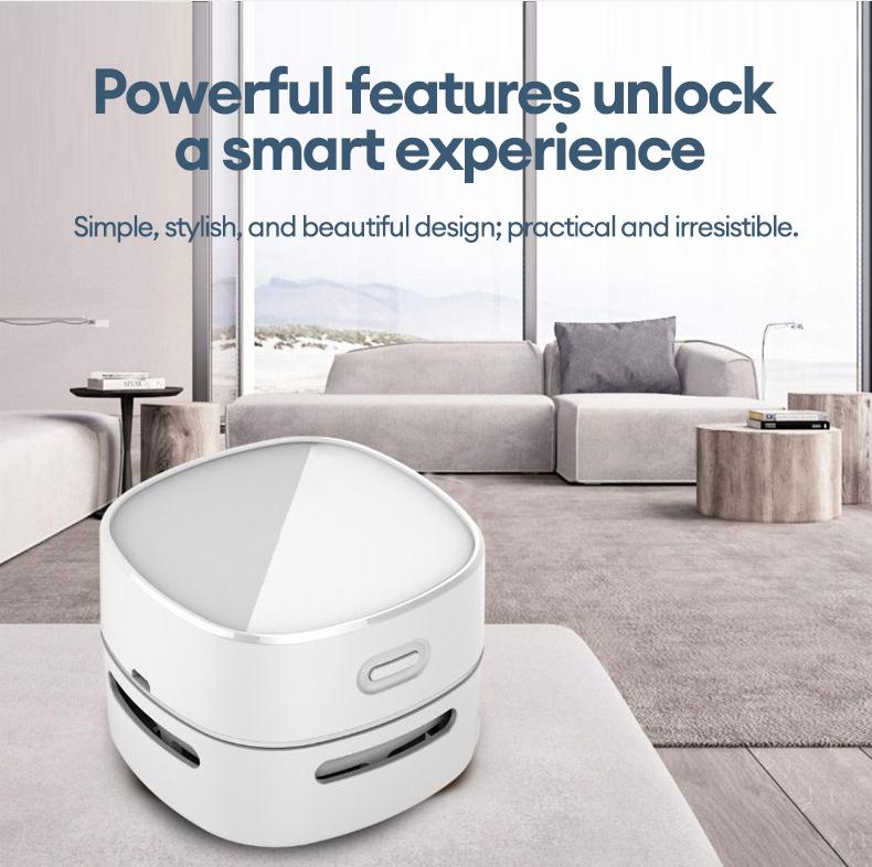 PAXA Desktop mini vacuum cleaner, equipped with a cleaning brush, with strong suction power and long-lasting battery life, suitable for desktop office use.