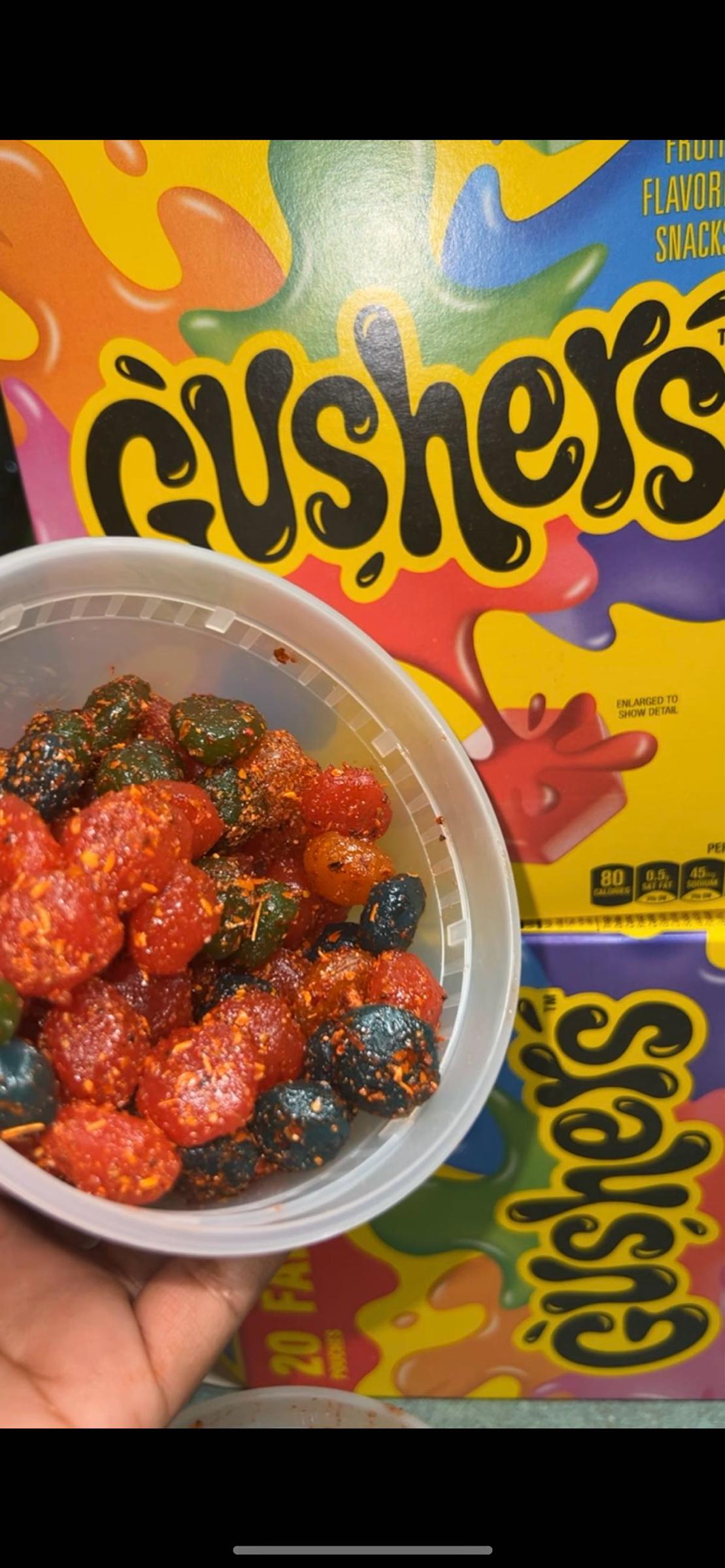 Chamoy Gushers - Spicy Rice Candy with Colorful Raisins in Clear Plastic Container